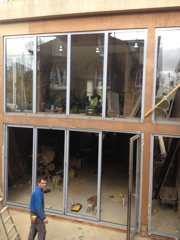 Aluminium bi-fold doors with two-storey glazing in Blackheath